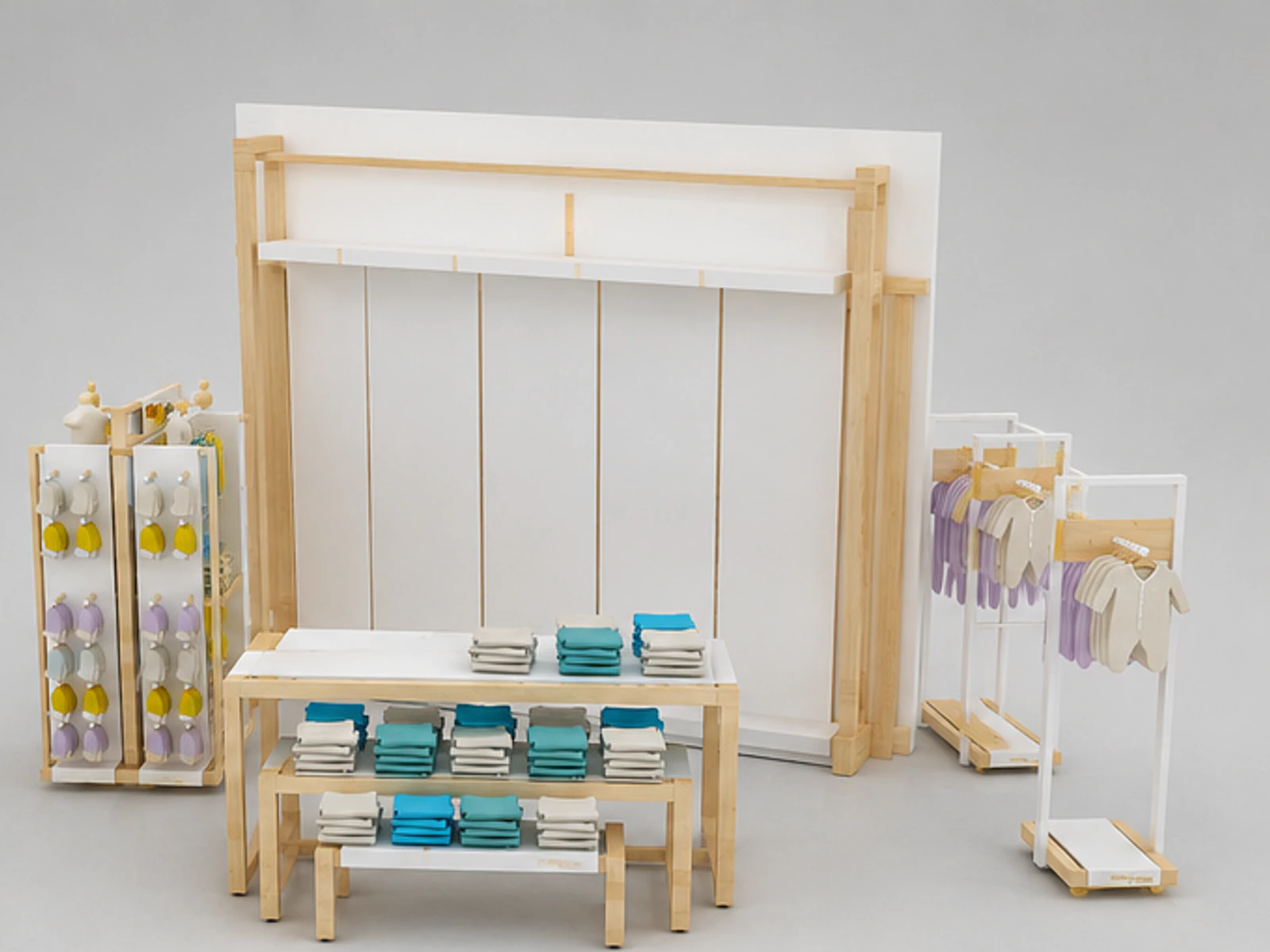 Kids Clothing Kiosk Wooden Baby Shop Retail Fixture angled clothing display view