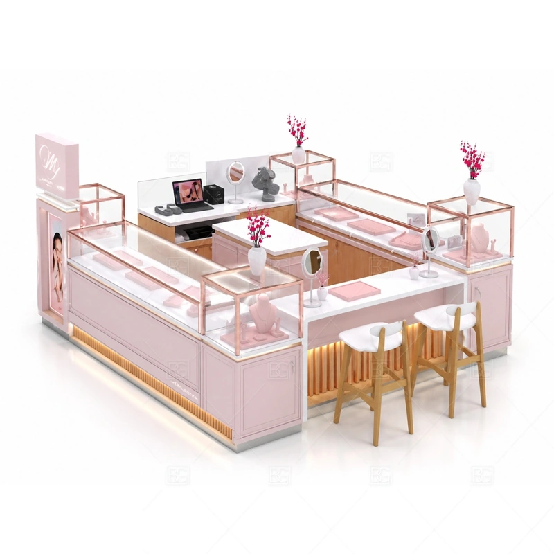 Pink Jewelry Kiosk with Seating Area with pink surfaces for fashion jewelry, gifting, and softer customer appeal shown in the pink jewelry kiosk with seating area product photos, with seating or consultation planning for longer jewelry selection conversations