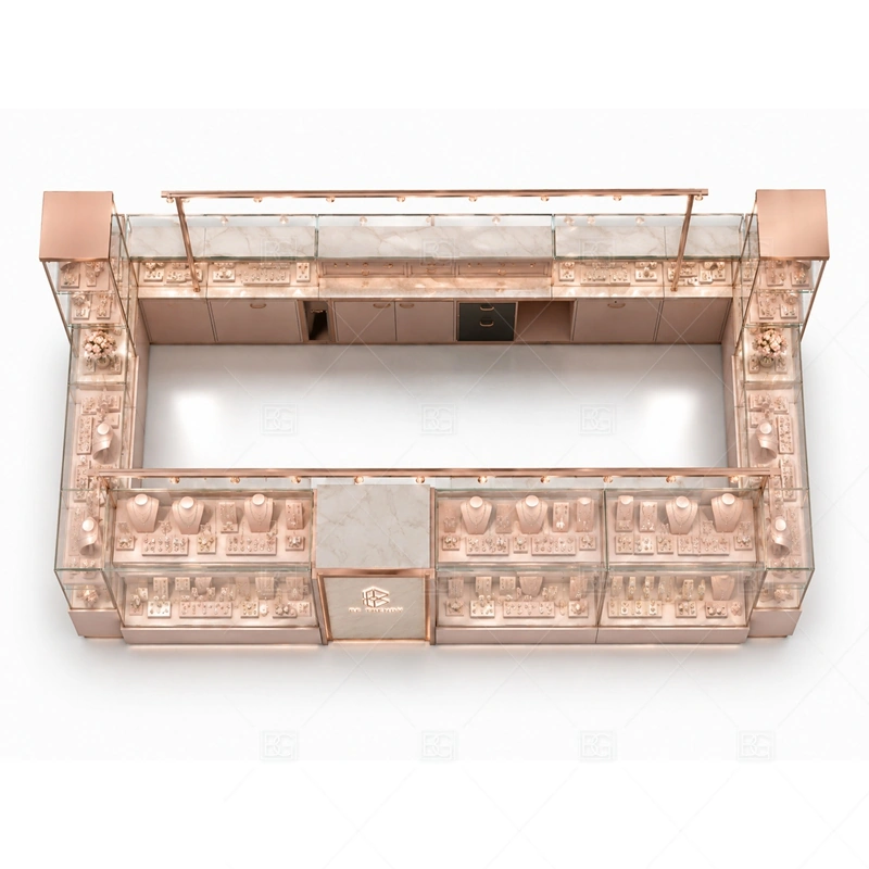 Rose Gold Jewelry Kiosk with Corner Displays storage and security detail for under-counter tray drawers, lockable stock cabinets, POS space, and packaging storage planned for rose gold jewelry kiosk with corner displays