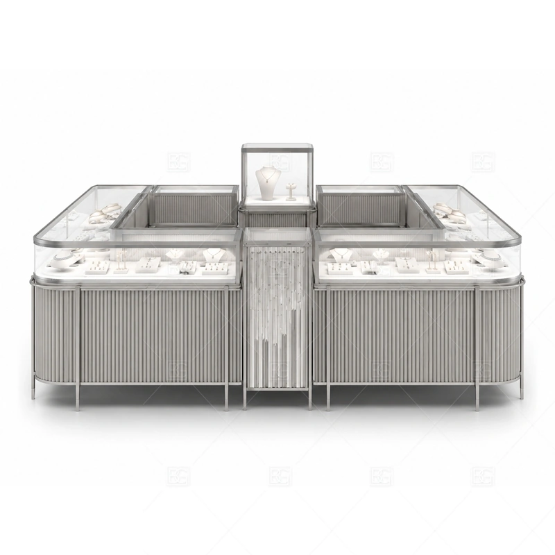 Silver Jewelry Kiosk with Ribbed Panels brand signage detail for clean logo panels matched to silver details coordinated with silver trim and neutral surfaces for a clean modern retail image for the silver jewelry kiosk with ribbed panels front presentation