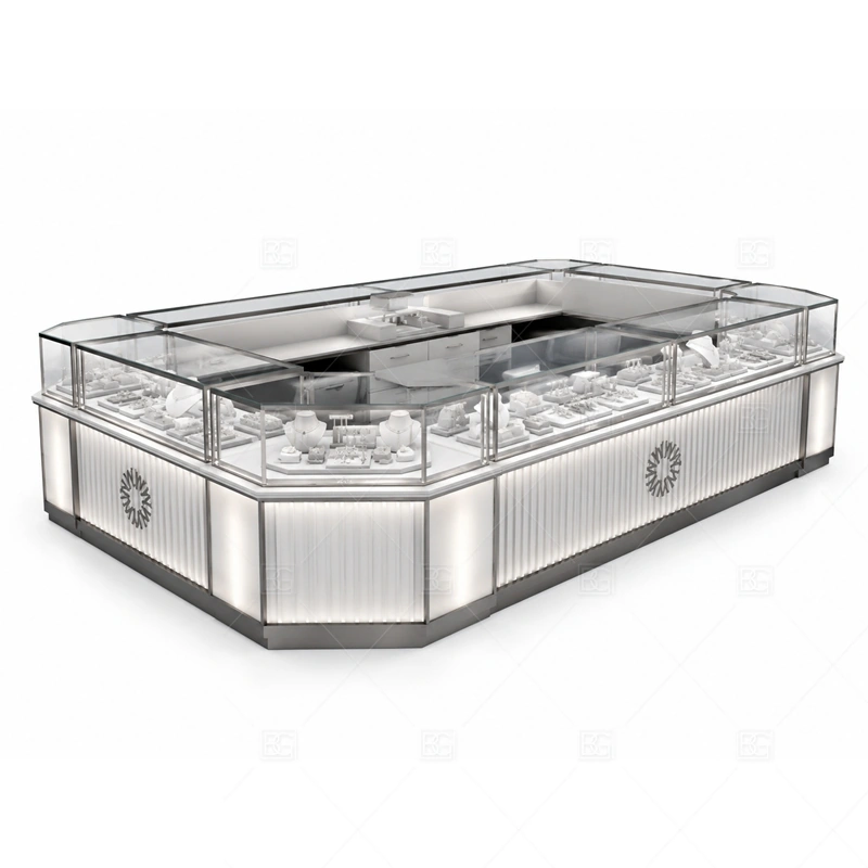 Silver Rounded Jewelry Kiosk with Glass Cases with silver trim and neutral surfaces for a clean modern retail image shown in the silver rounded jewelry kiosk with glass cases product photos, with rounded counter flow that softens customer movement around the showcases